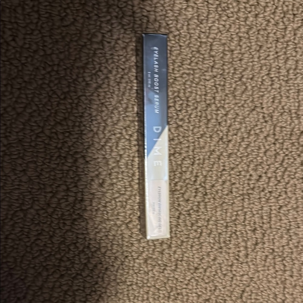 DIME boost duo eyelash serum and eyebrow enhancing gel.